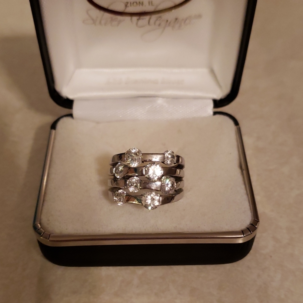 Silver ring with CZ stones.  Steelx  brand